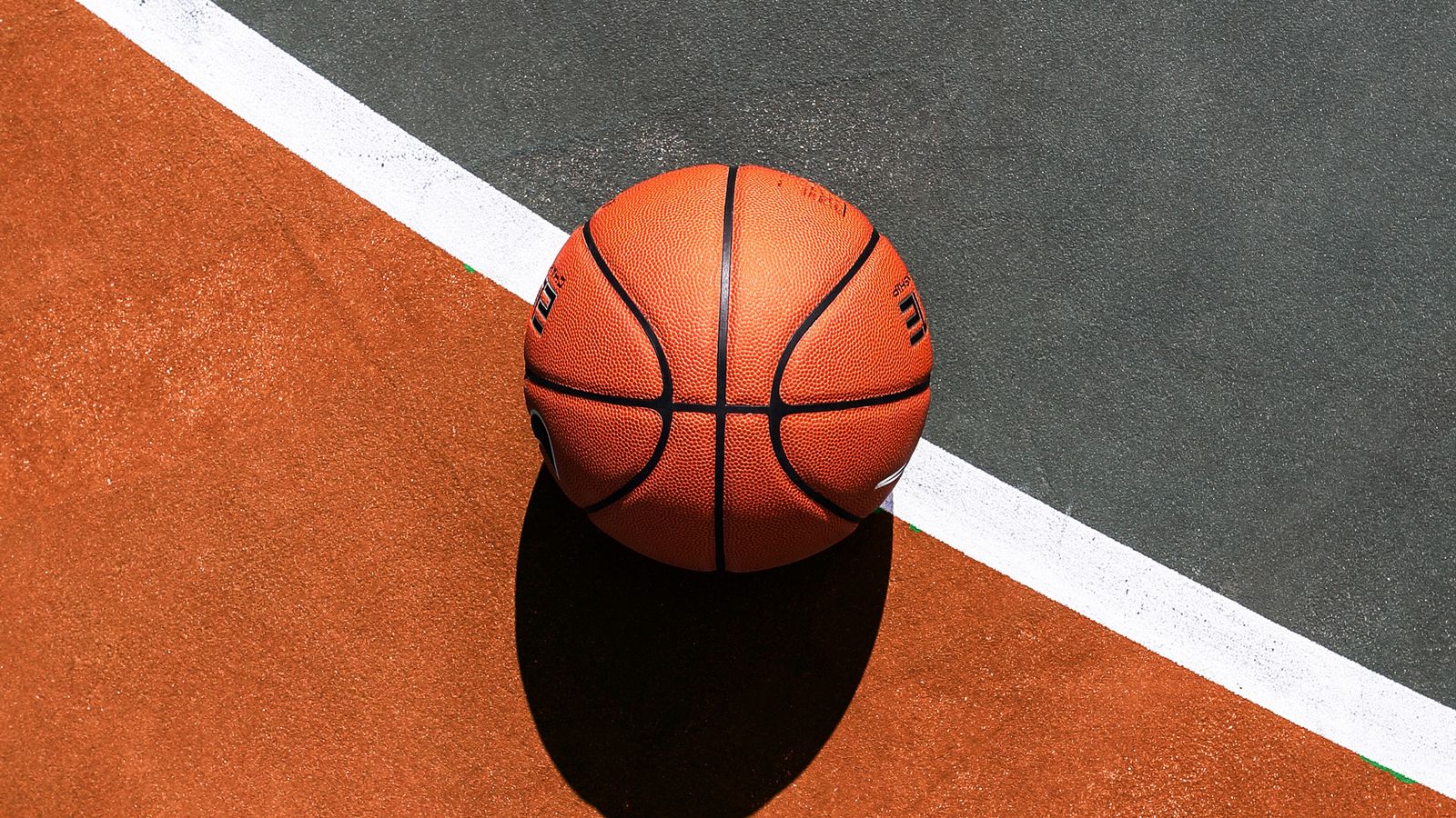 A basketball on a court.